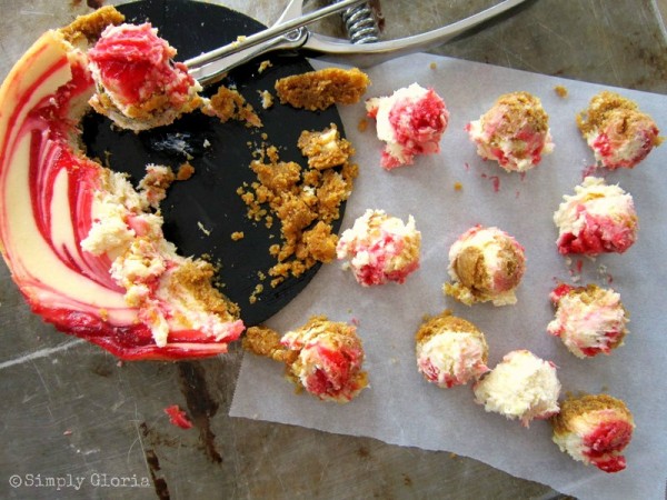 Strawberry Cheesecake Bites rolled then covered with white chocolate