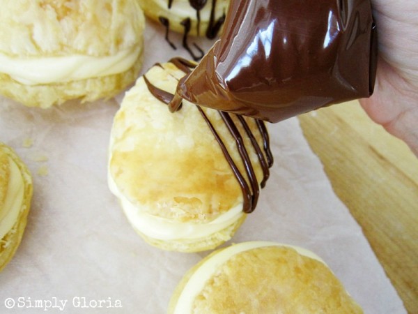 Cheesecake Cream Puffs - drizzled with chocolate